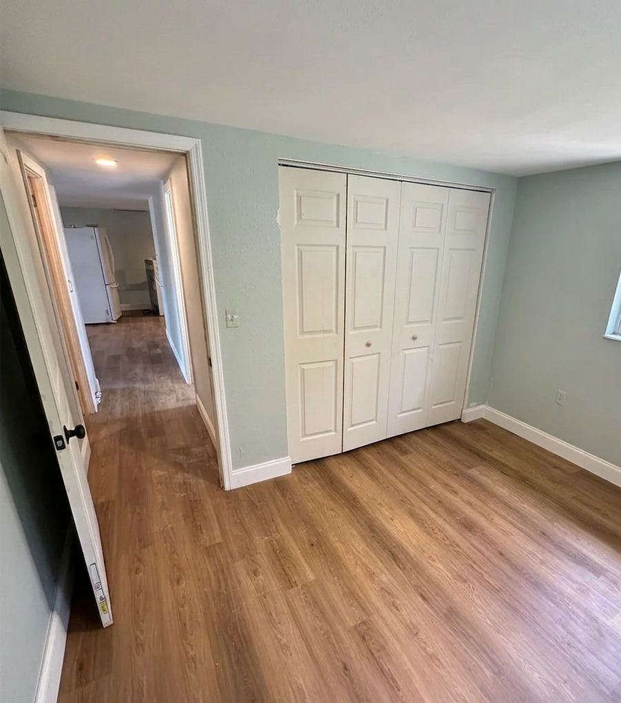 Vinyl plank flooring installed in a West Houston bedroom