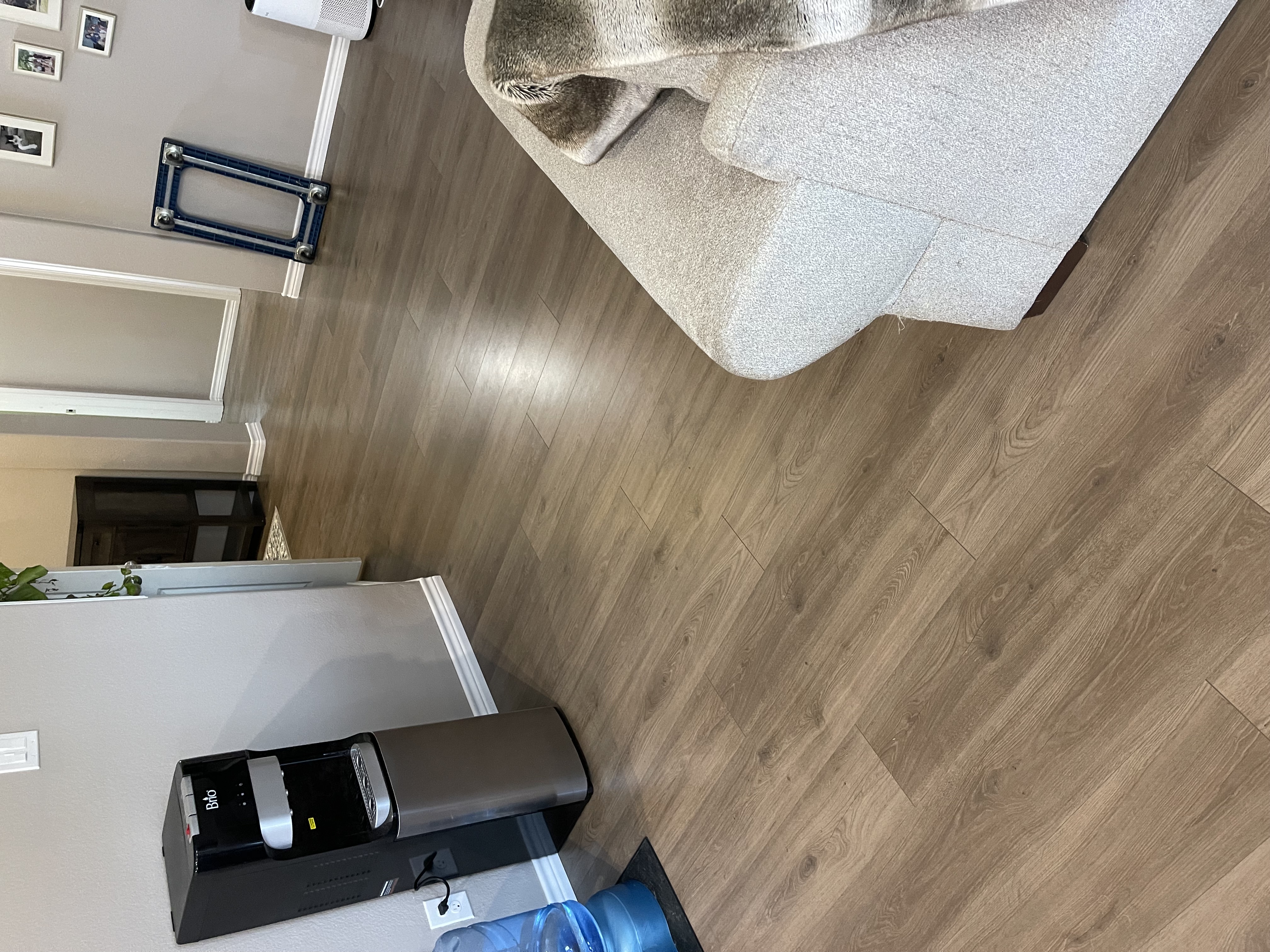 Light vinyl plank flooring installed in a Houston bedroom by J&L Luxury Flooring Houston